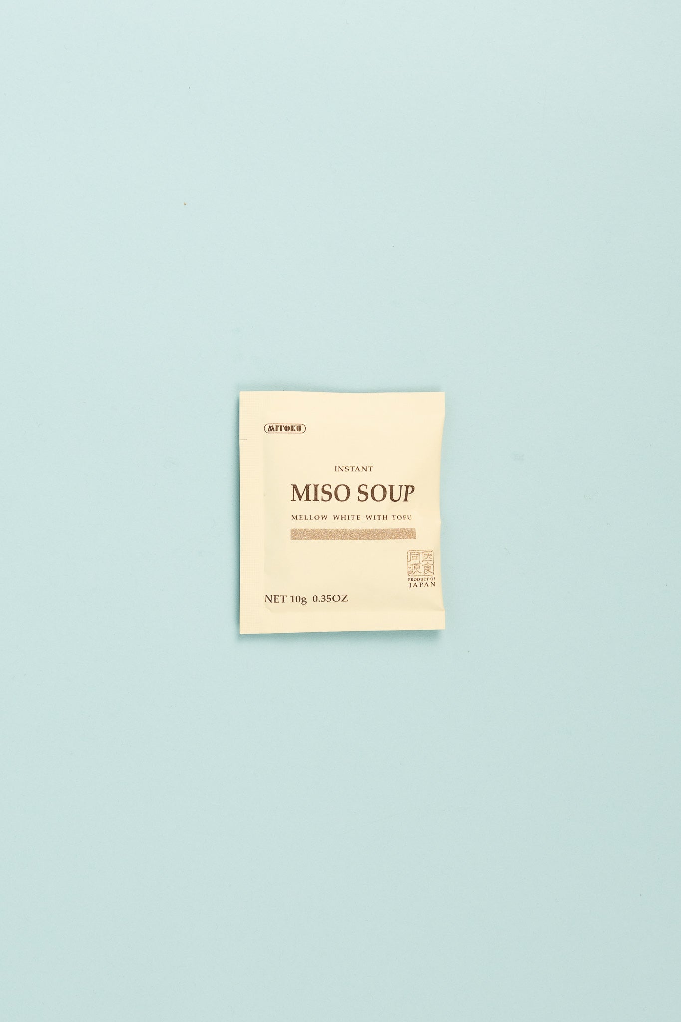 Mitoku Instant Miso Soup - Mellow White With Tofu package on a light blue background.