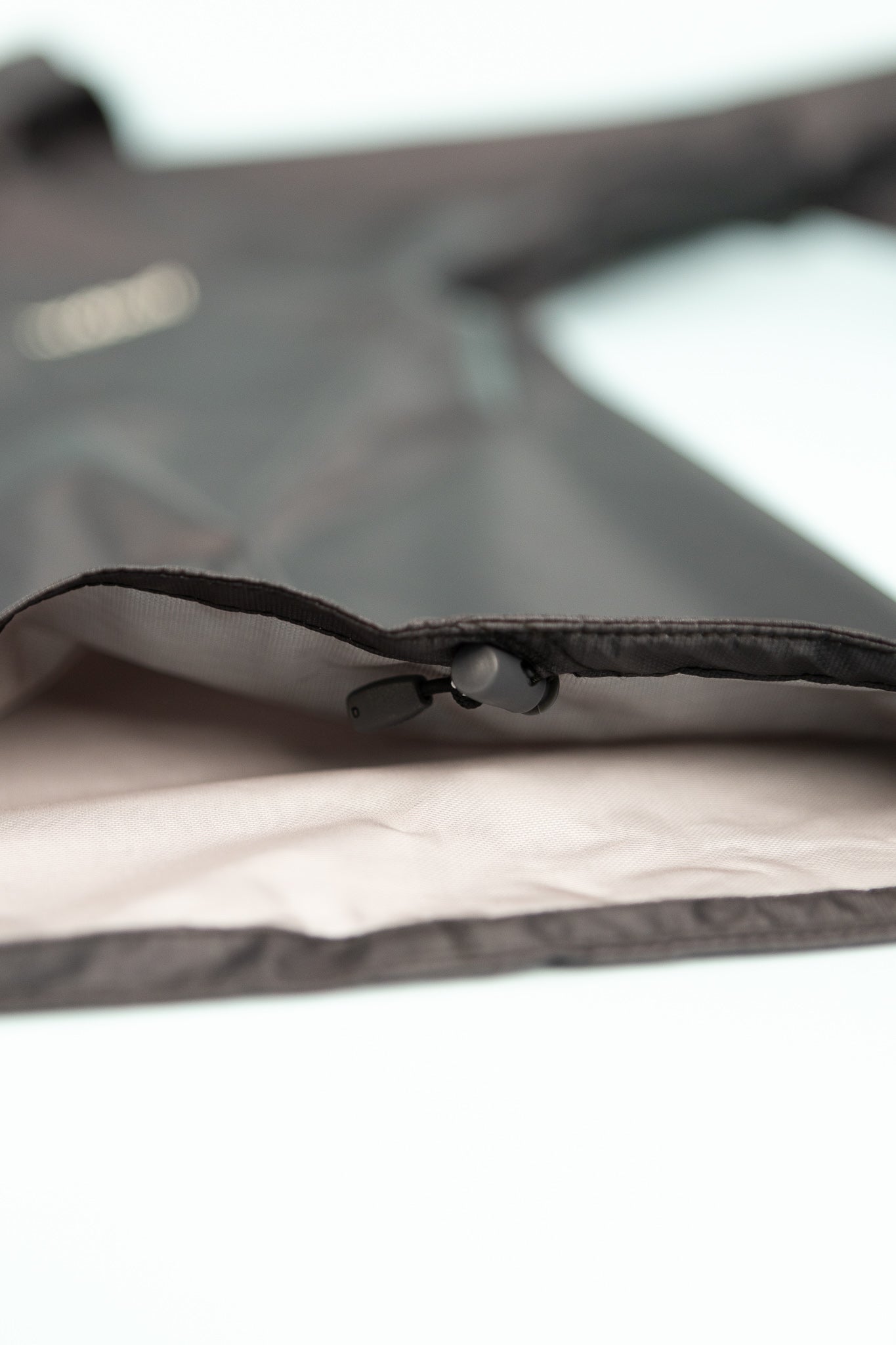 Close-up view of the US Women's Versalite Jacket - Black showcasing the fabric texture and zipper detail.