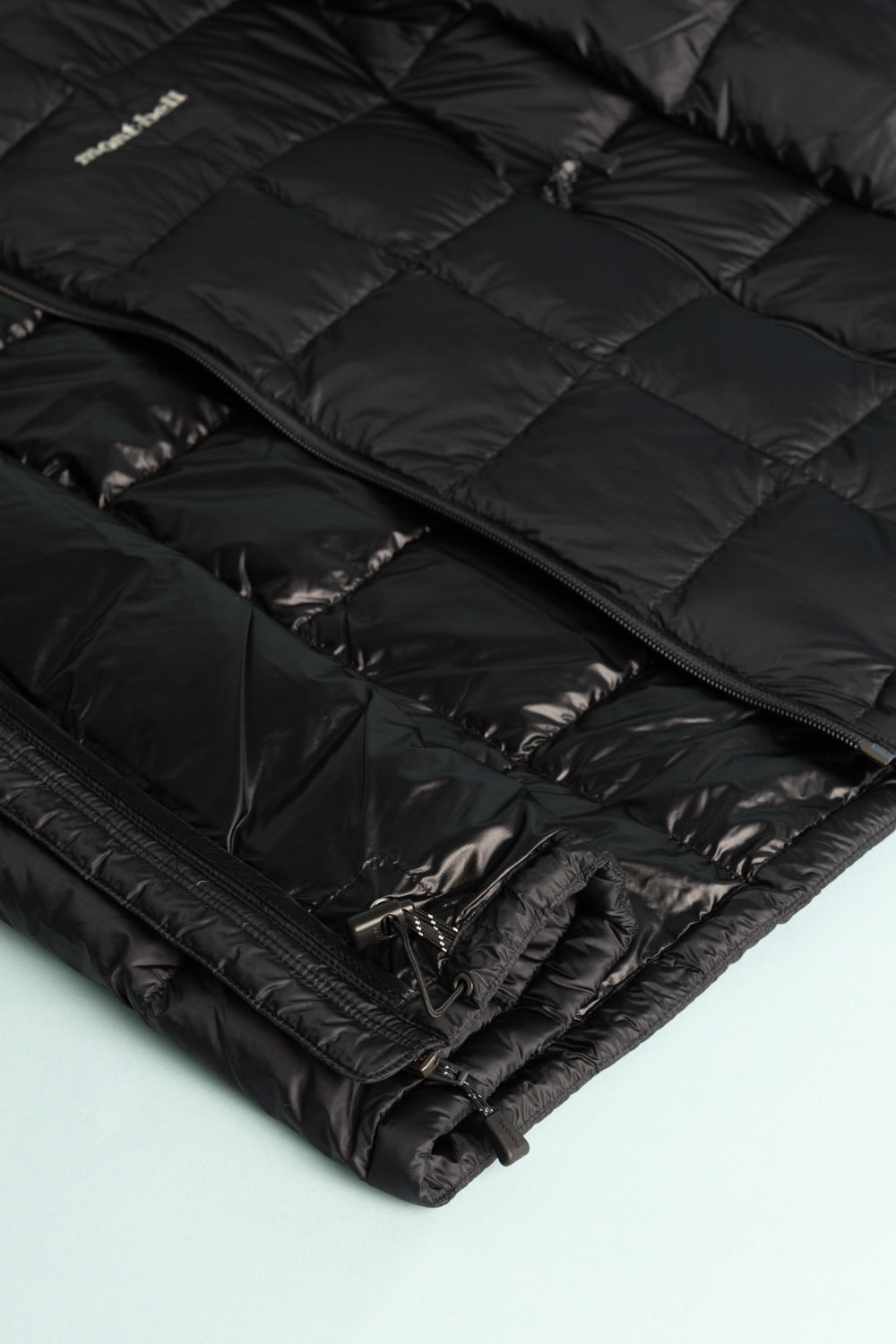 Montbell US Men's Superior 800 Down Jacket - Black, showcasing its lightweight and warm design.