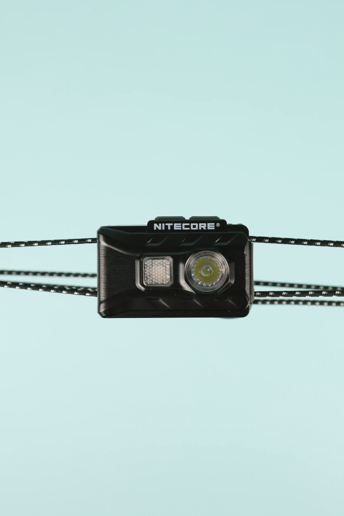Nitecore NU20 - Classic ultralight headlight with glow-in-the-dark reflective headband for nighttime adventures.