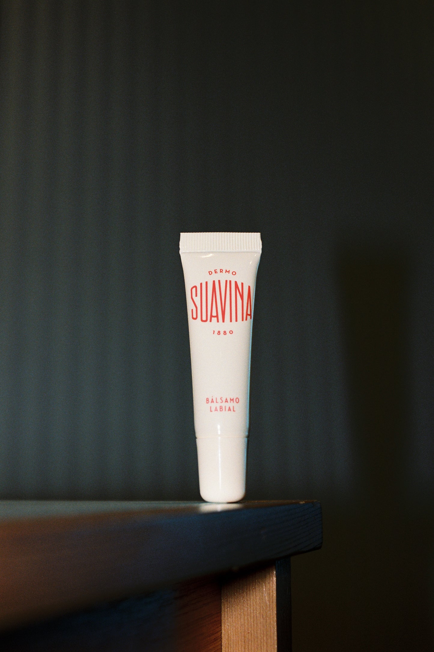 Original Lip Balm in a 10ml tube, featuring natural essential oils for dry lips, sold in stylish packaging.