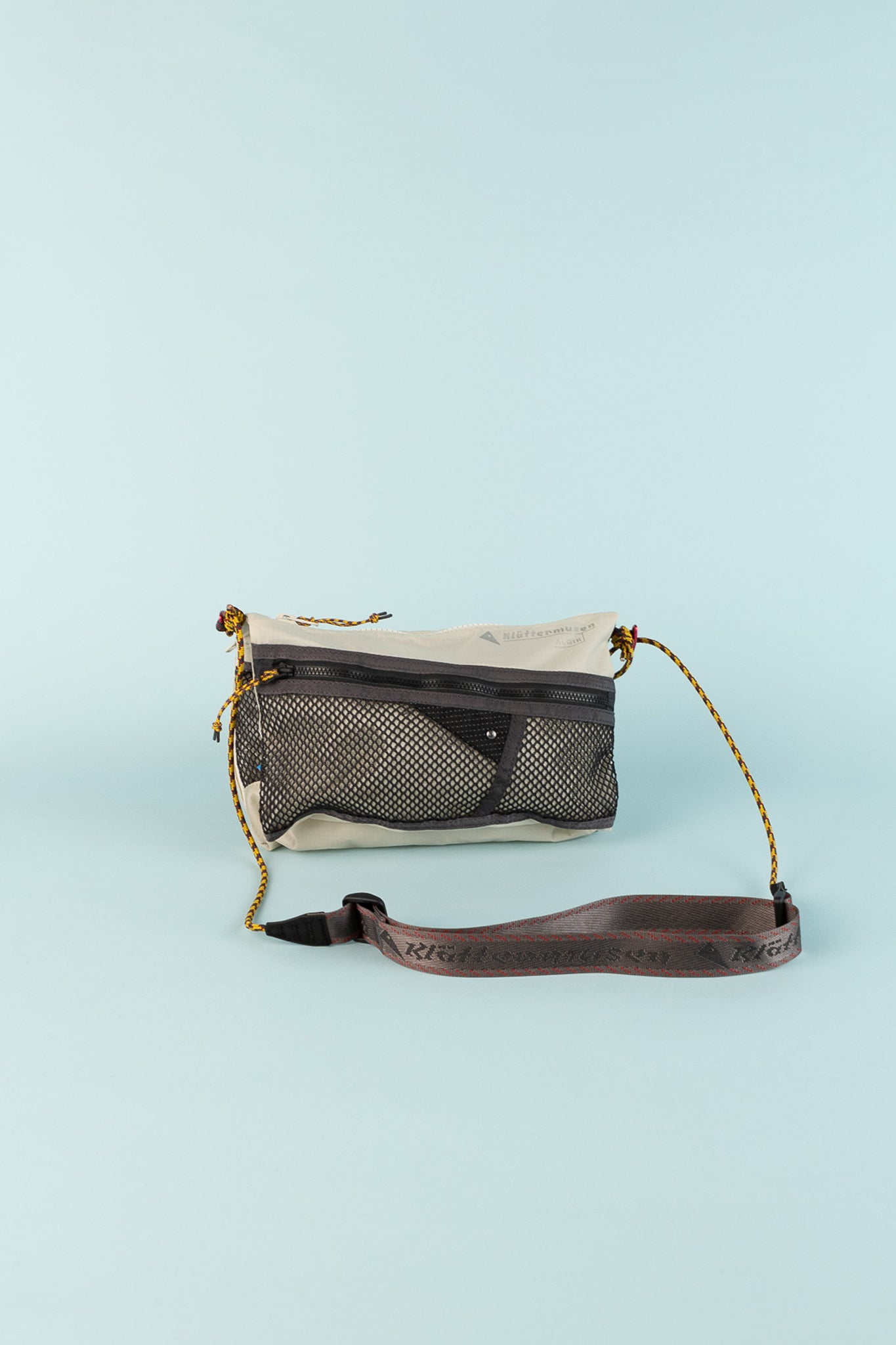 Klattermusen Algir Foldover Bag in Putty Grey.