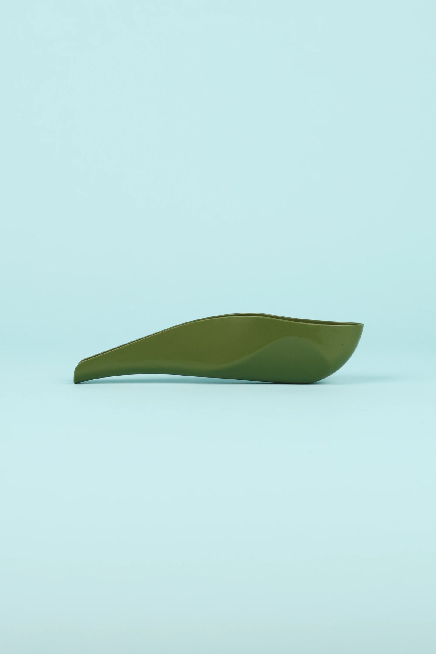 pStyle - Olive, a green plastic device for women and non-binary folks to pee standing up without undressing.