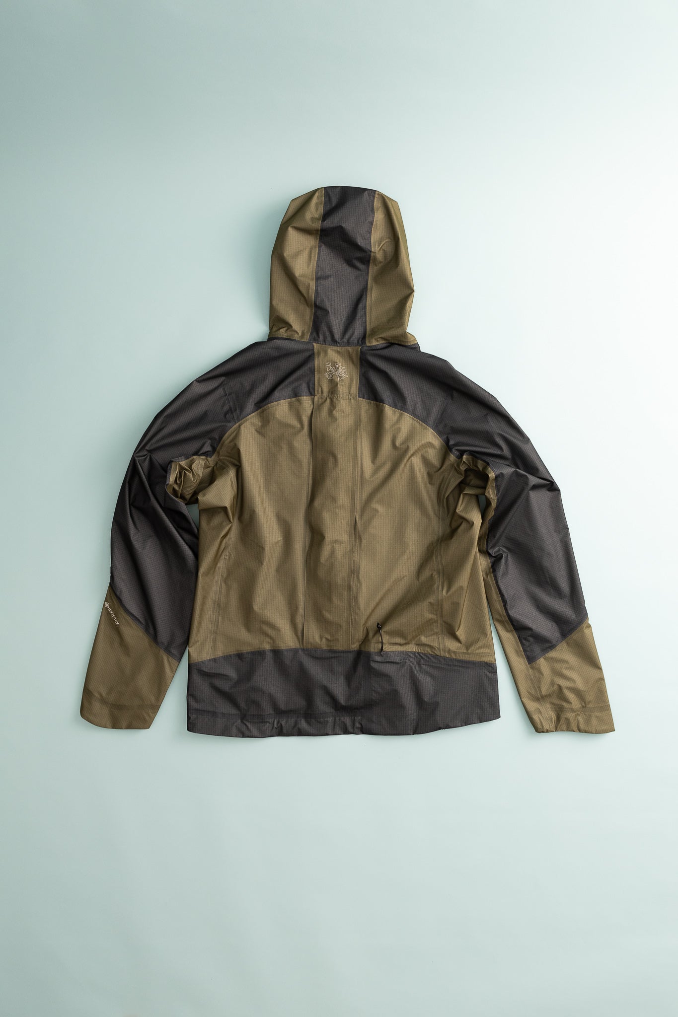 Back view of the Sphere LT GORE-TEX Jacket in Dark Olive color, showcasing its lightweight design and ergonomic fit.