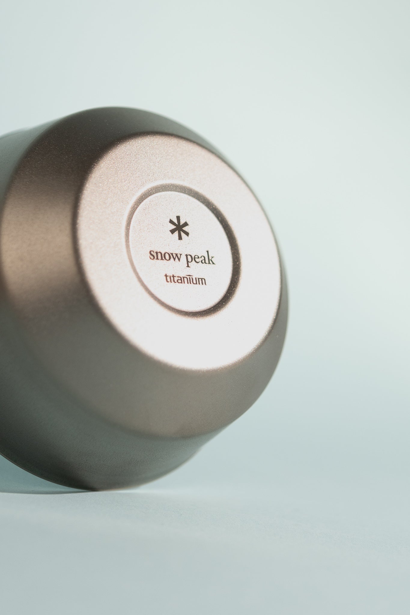 Titanium Double Wall Bowl showcasing the Snow Peak logo and titanium material detail.
