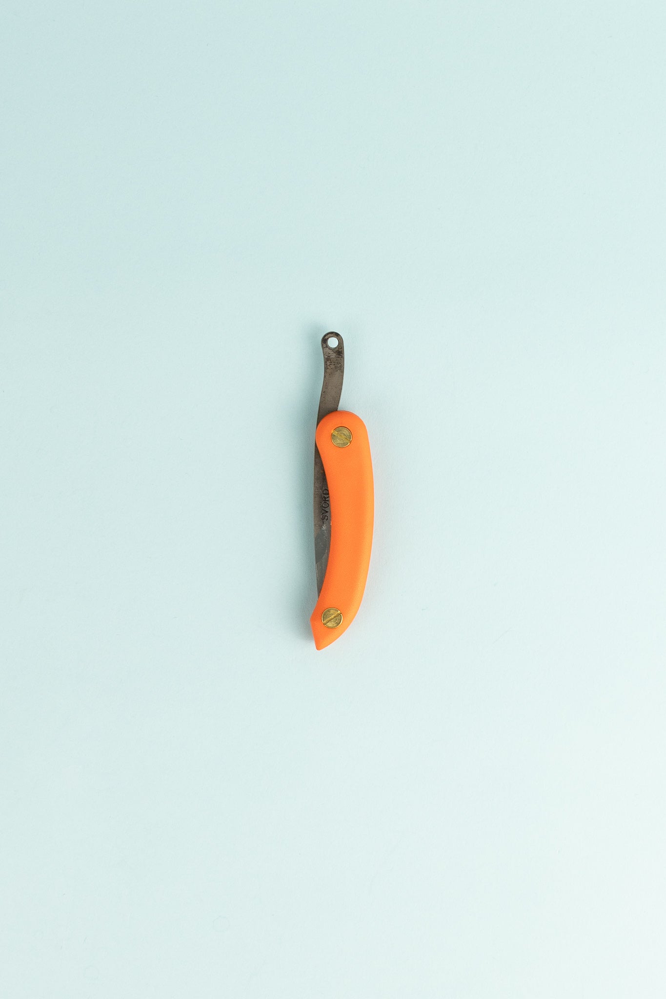 Peasant Knife Mini - Orange, handcrafted knife with orange handle and carbon steel blade, showcasing quality craftsmanship.