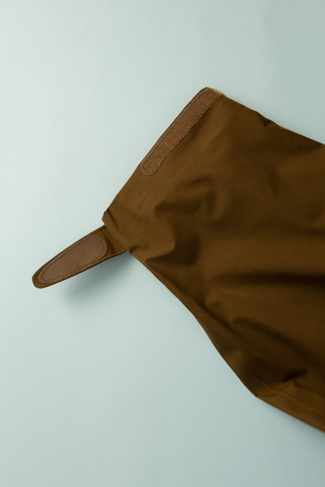 US Men's Tempest Jacket - Khaki sleeve detail featuring a durable fabric and leather accent.