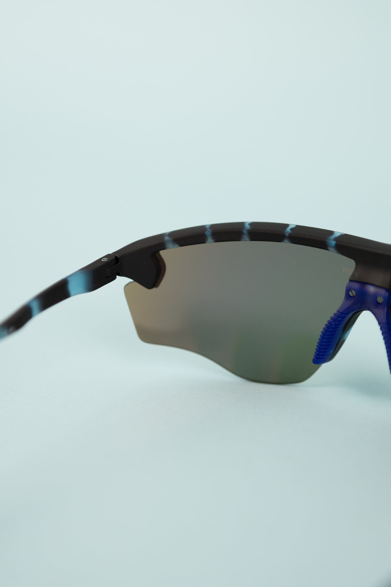 Junya Racer Sunglasses in Midnight Mosaic/D+ Fire Mirror with sculpted lens and custom temples for running and cycling.