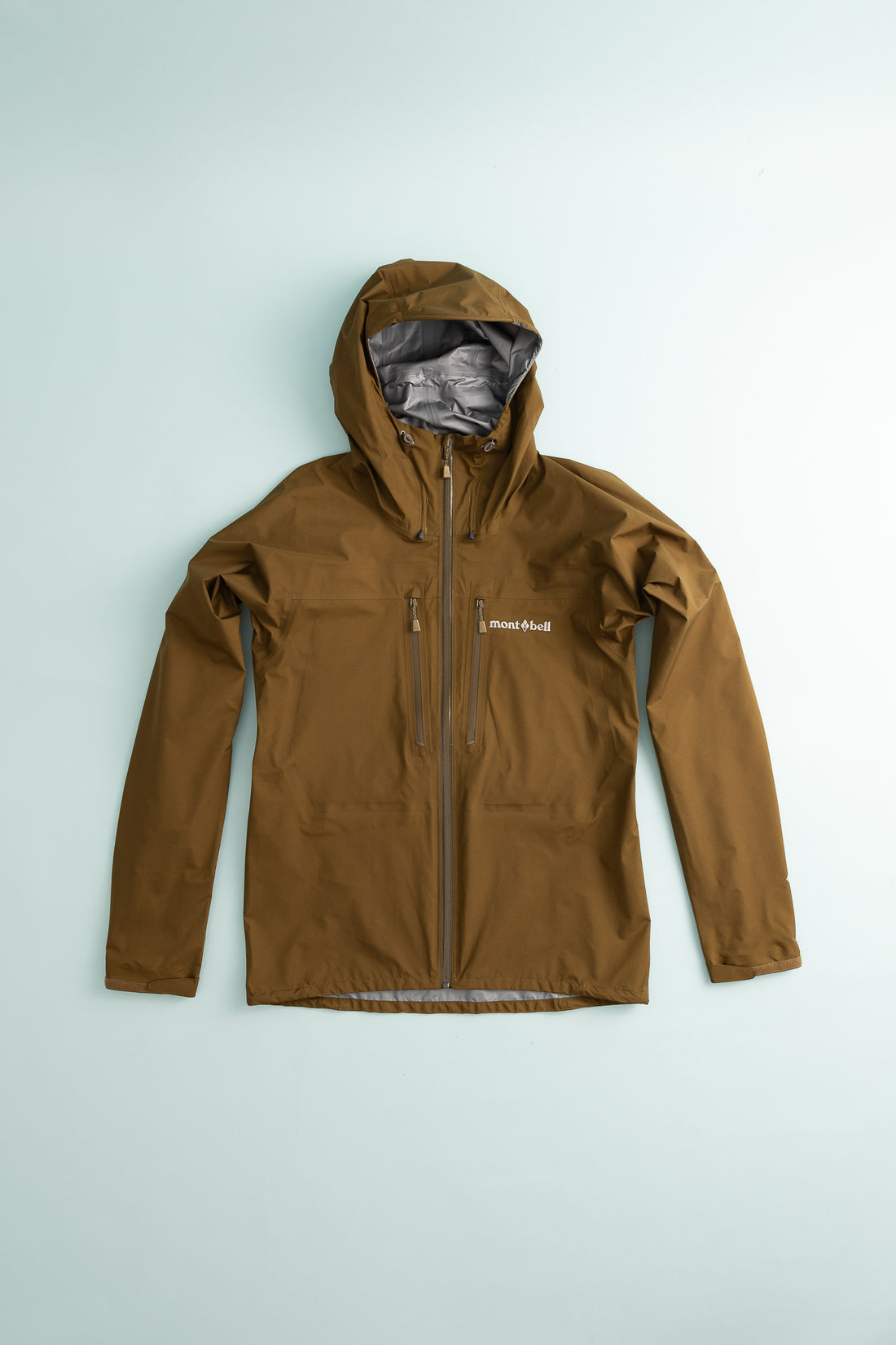 US Men's Tempest Jacket in khaki color with hood, showcasing an ultralight rainwear design.