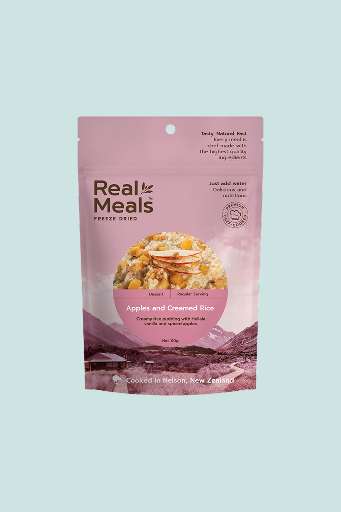 Apple & Creamed Rice packaging from Real Meals featuring creamy rice with spiced apples, perfect for dessert or breakfast.