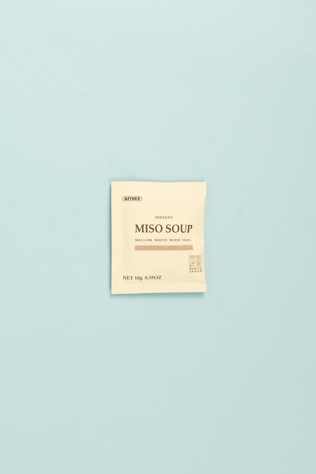 Mitoku Instant Miso Soup - Mellow White With Tofu package on a light blue background.