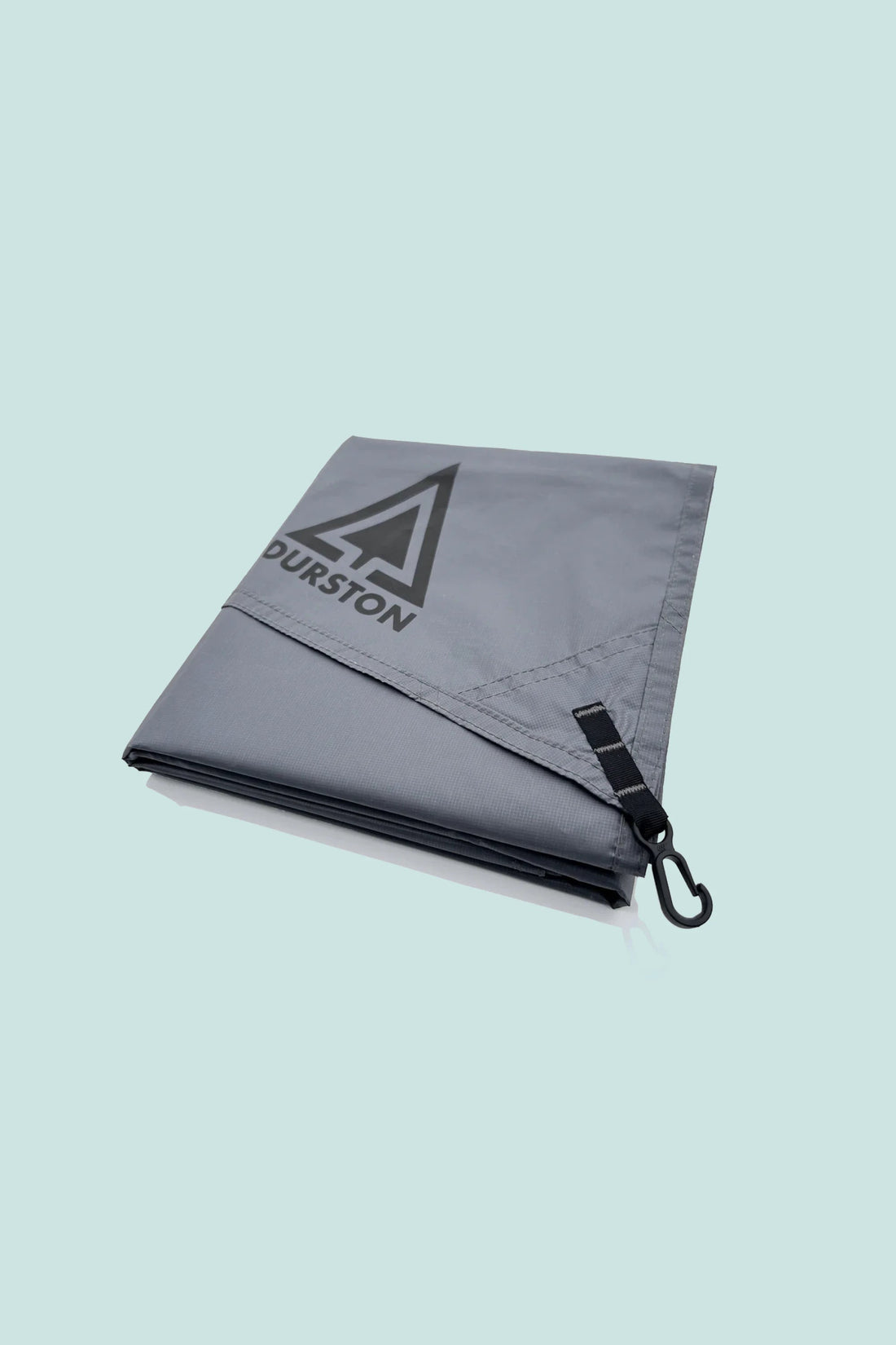 Durston Groundsheet - X-Mid 1/X-Mid 1 Solid folded with hook on a pastel background.