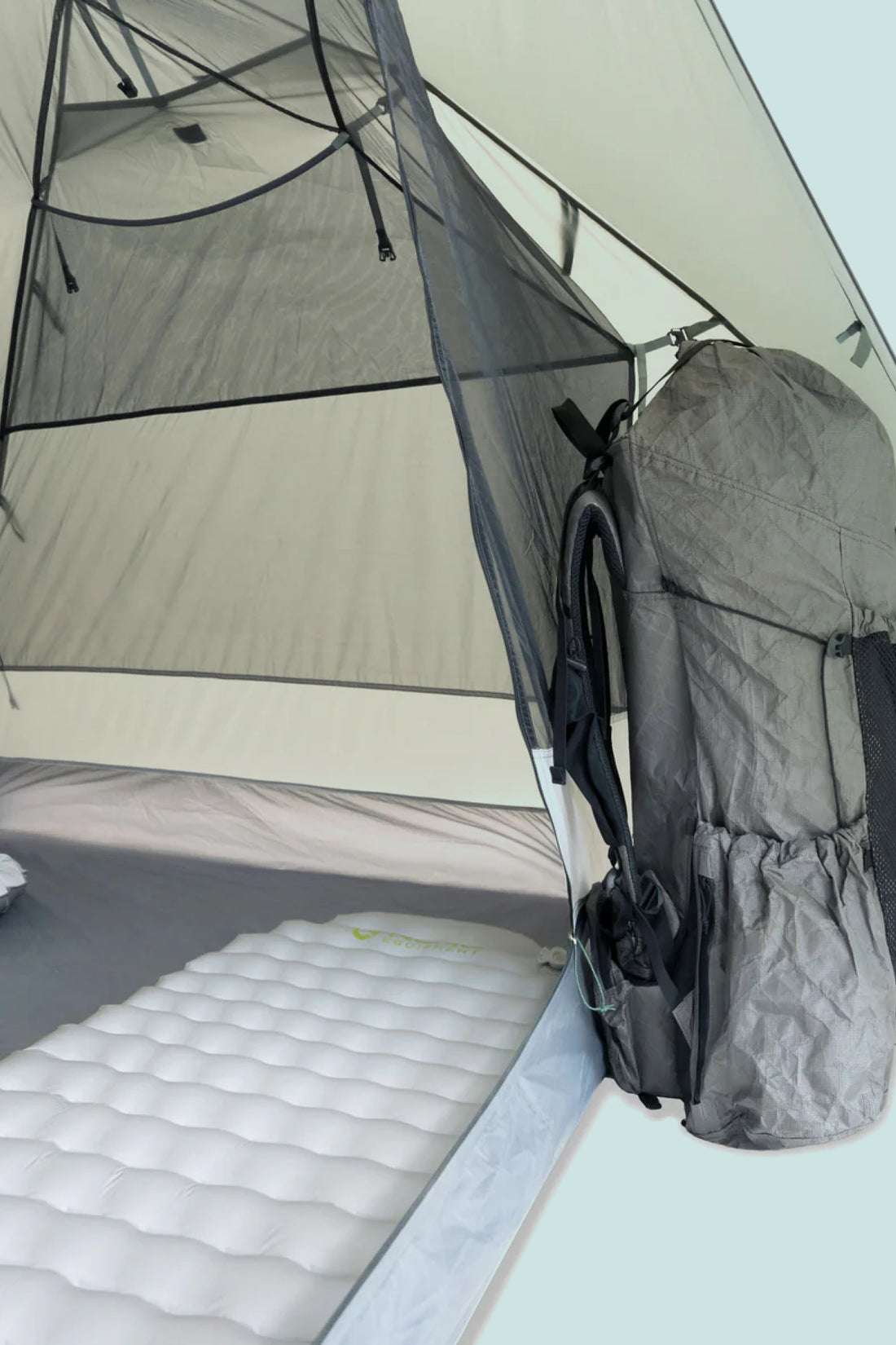 Inside view of the Pre Order - Durston X-Dome 2 tent featuring a backpack and sleeping pad.