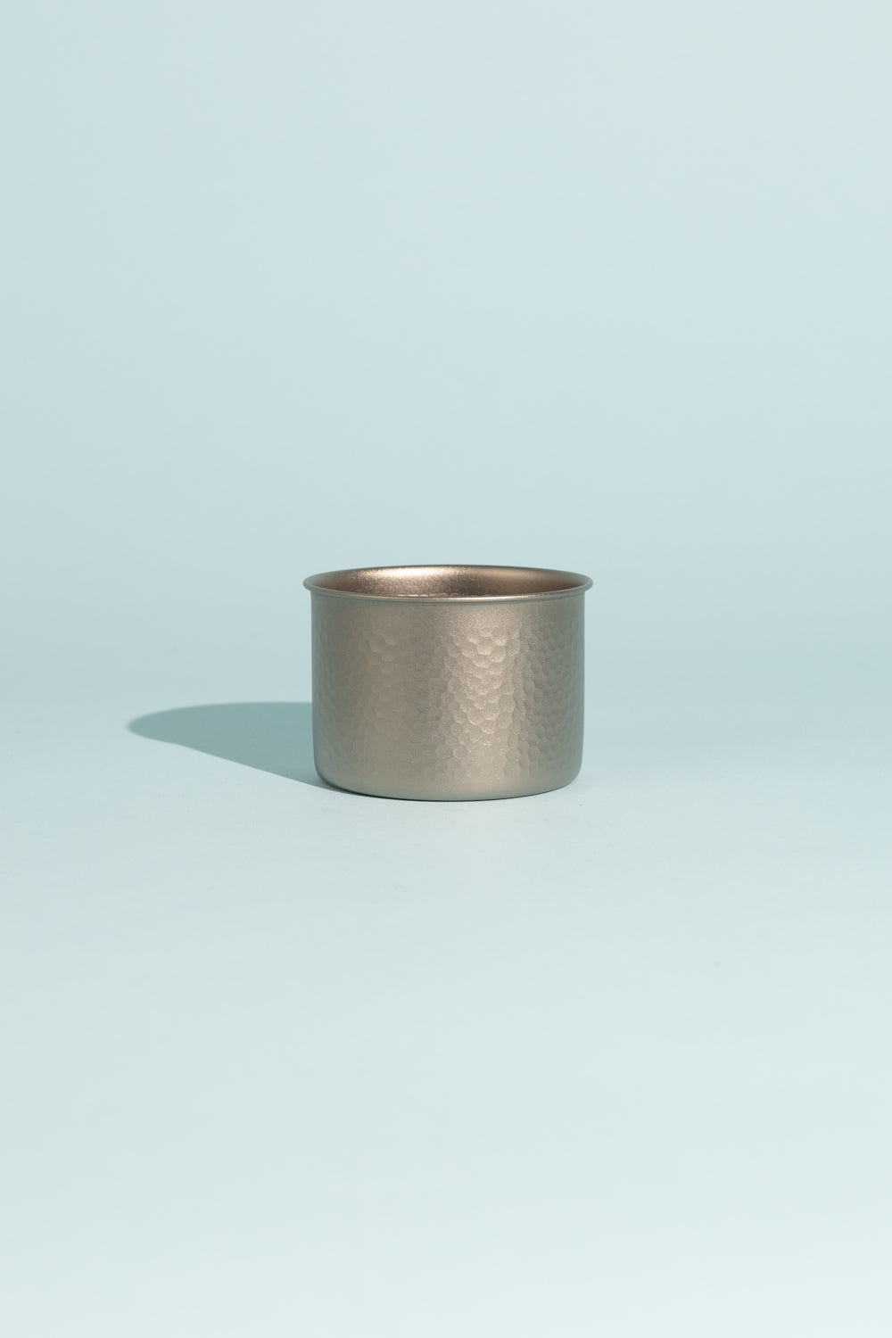 Evernew GubiGubi Titanium Cup with hammered finish on a light background, showcasing its sleek design and craftsmanship.