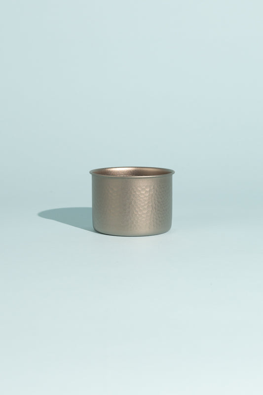Evernew GubiGubi Titanium Cup with hammered finish on a light background, showcasing its sleek design and craftsmanship.