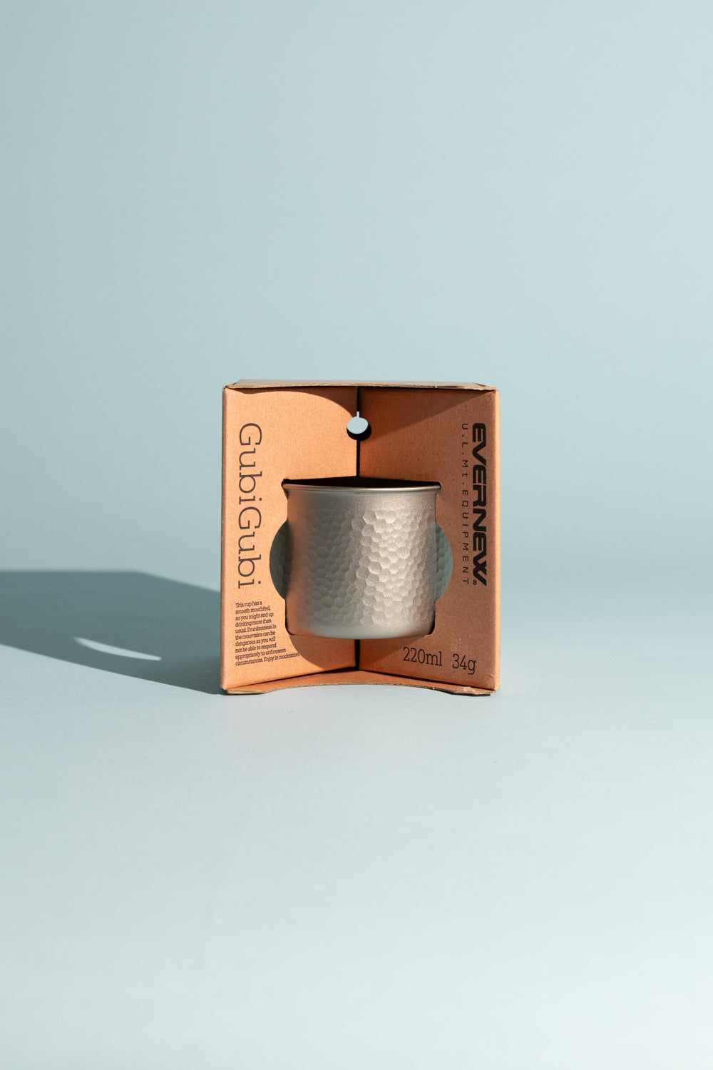 Evernew GubiGubi Titanium Cup in its packaging, showcasing the unique hammered finish and lightweight design.