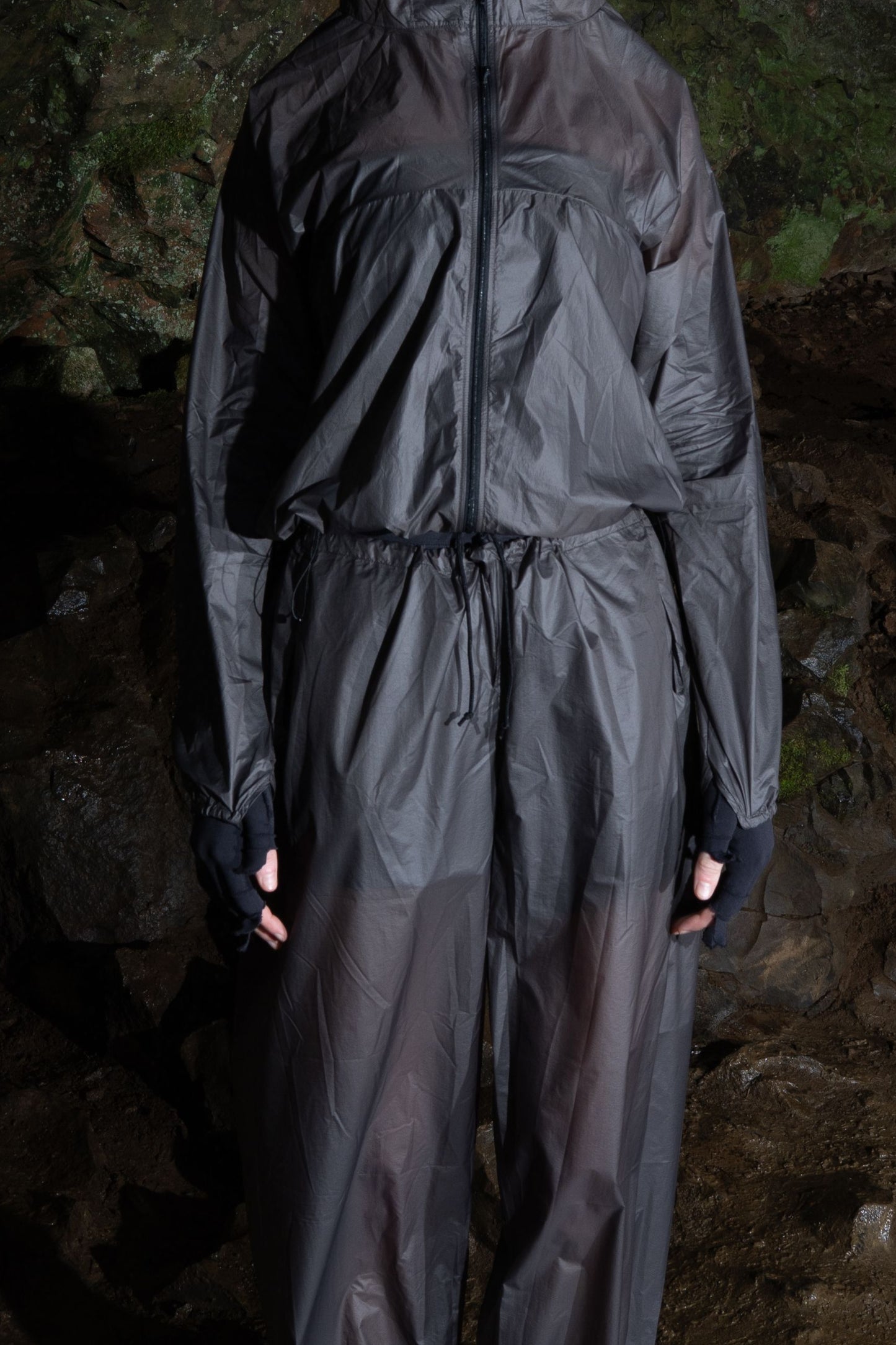 Model wearing Gnuhr Breaker Wind Pant in Iron, showcasing lightweight and packable protection against the elements.