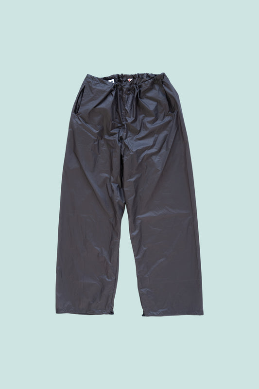 Gnuhr Breaker Wind Pant in Iron, lightweight and packable wind-resistant pants for outdoor activities.
