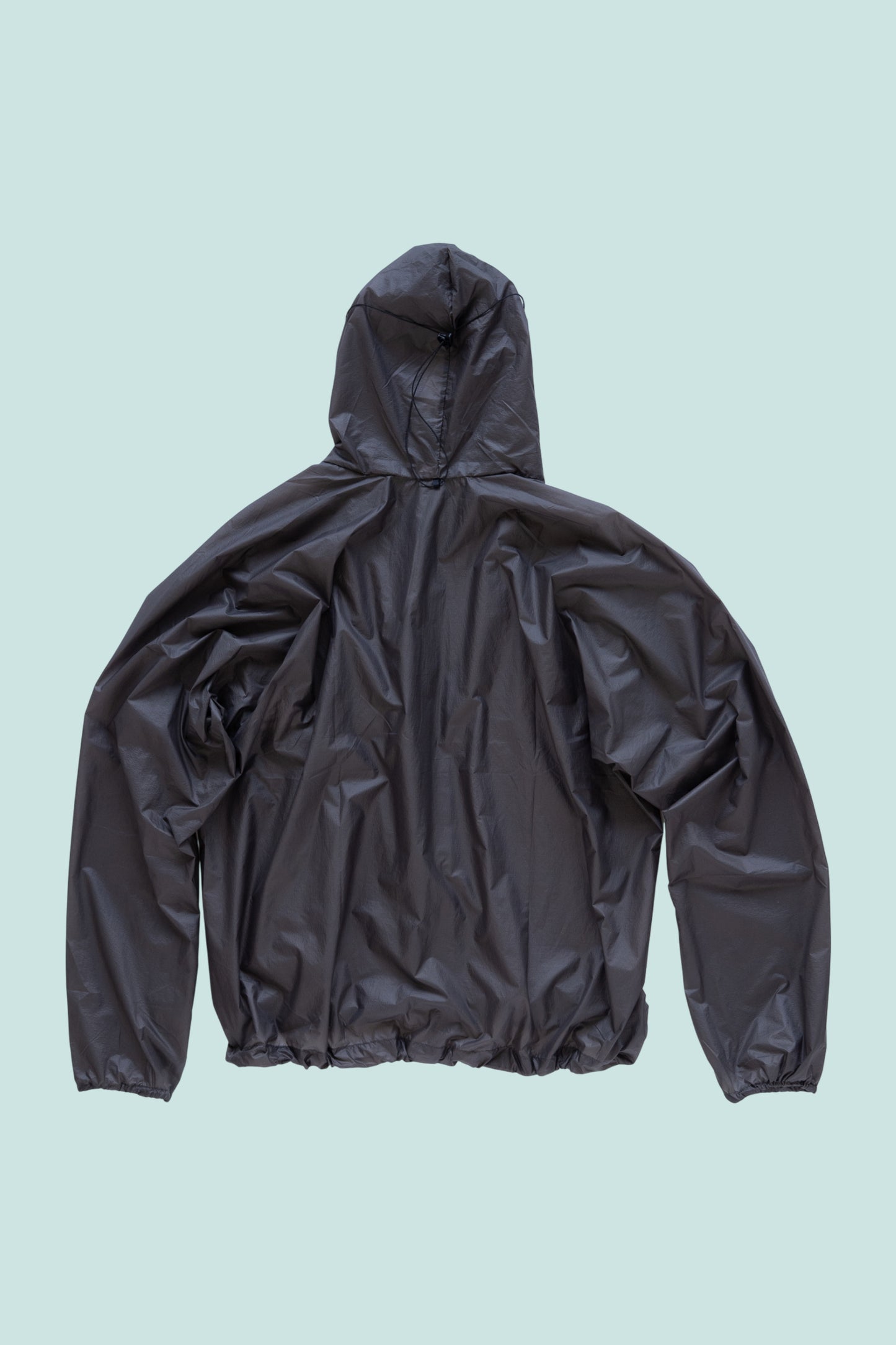 Gnuhr Breaker Wind Shirt v1.5 in Iron, lightweight, packable wind protection from the back view.