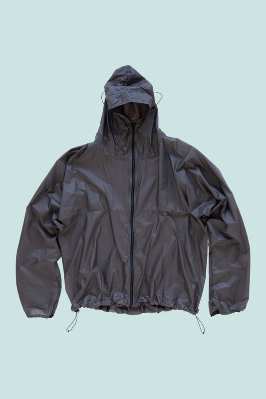 Gnuhr Breaker Wind Shirt v1.5 in Iron color, lightweight and packable outer layer for wind protection.