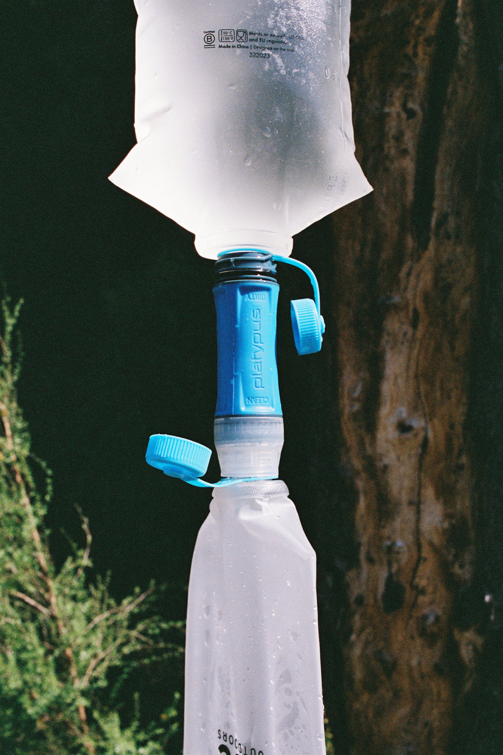Gravity Water Filter System featuring Platypus Quickdraw Filter and CNOC Vecto water bladders for ultimate convenience.