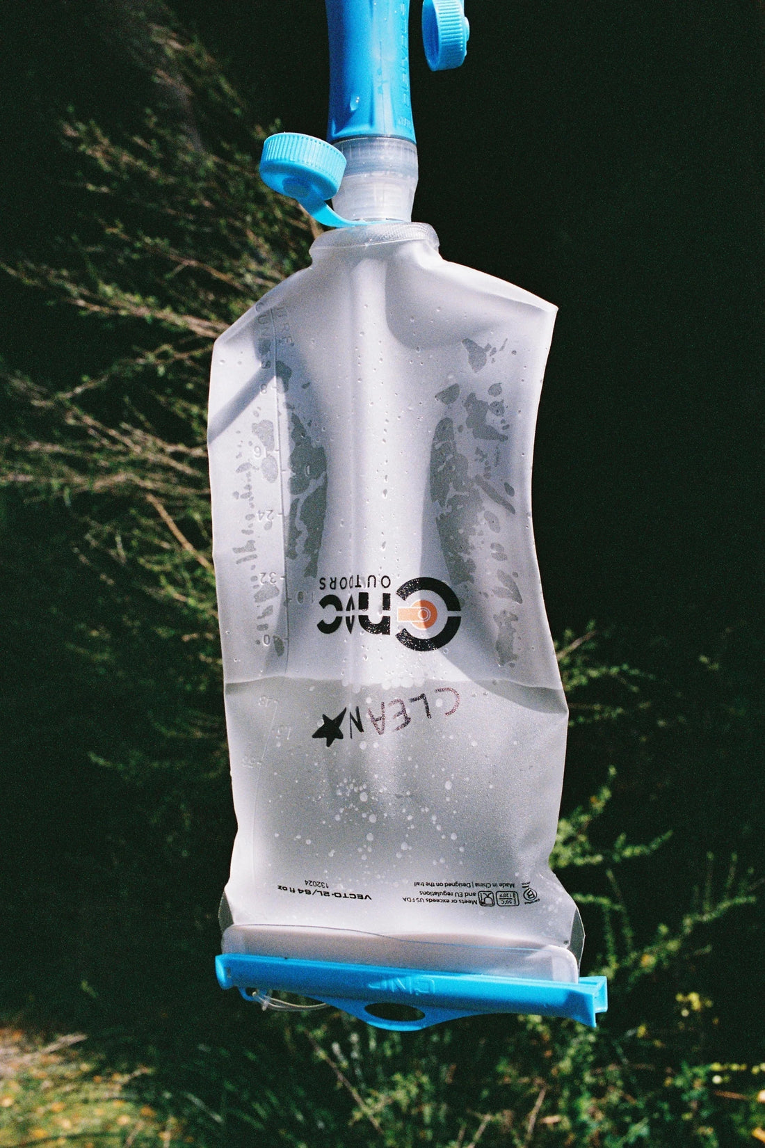 Gravity Water Filter System component: clear CNOC Vecto 2L water bladder filled with water.