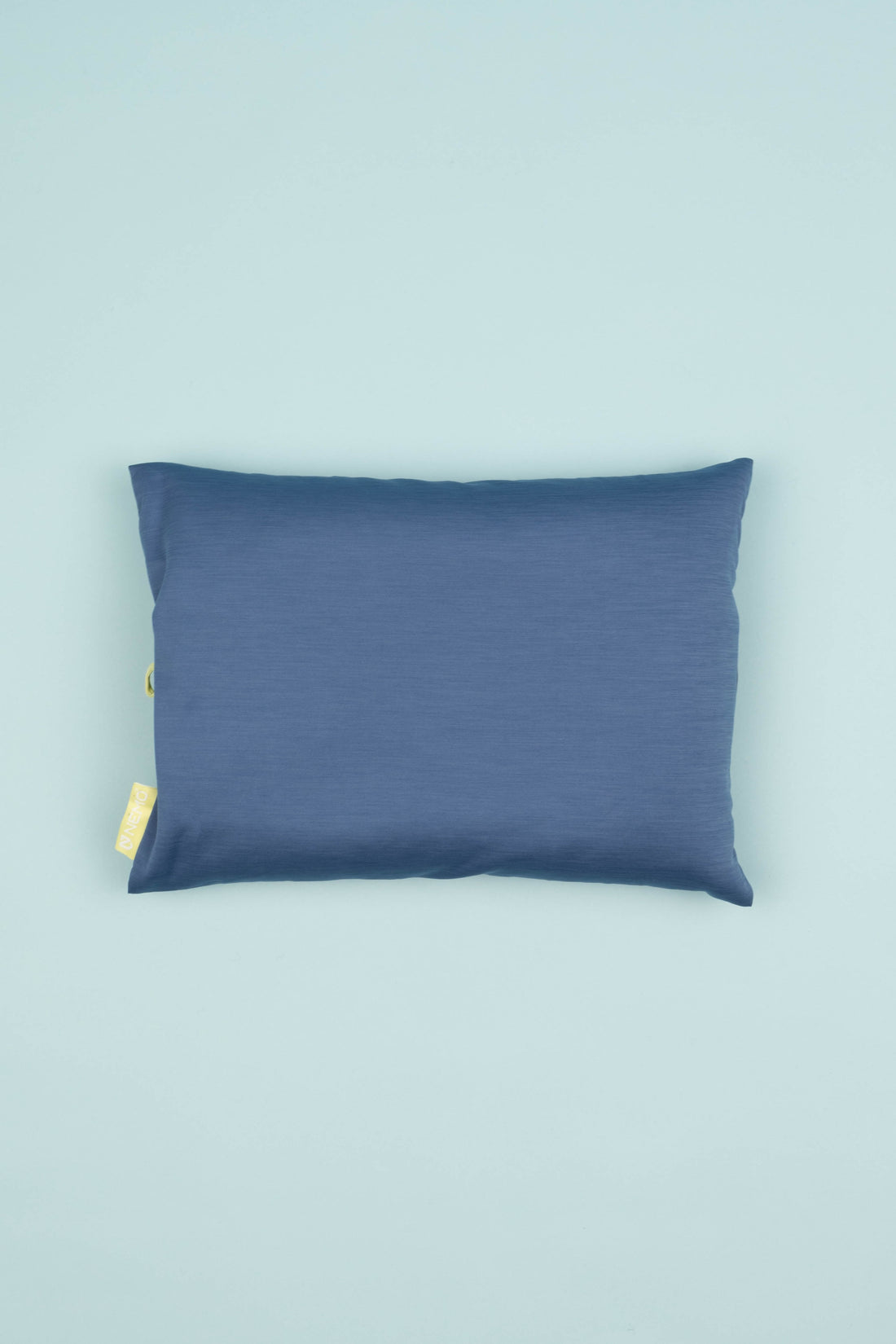 Nemo Fillo Elite Pillow - Blue Horizon on a light blue background, showcasing its soft texture and vibrant color.