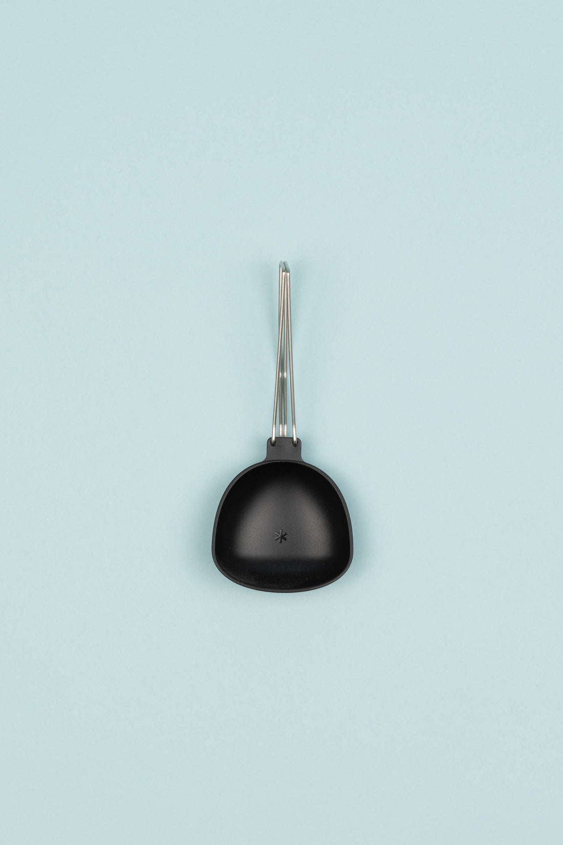 Snow Peak Yaen Ladle Tsugu - foldable camp cooking ladle with heat-resistant nylon and stainless steel handle.