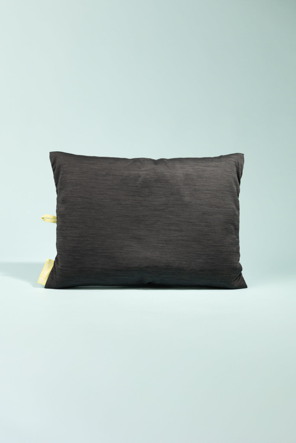 Nemo Fillo Elite Pillow - Black Pearl shown on a light blue background, highlighting its soft texture.