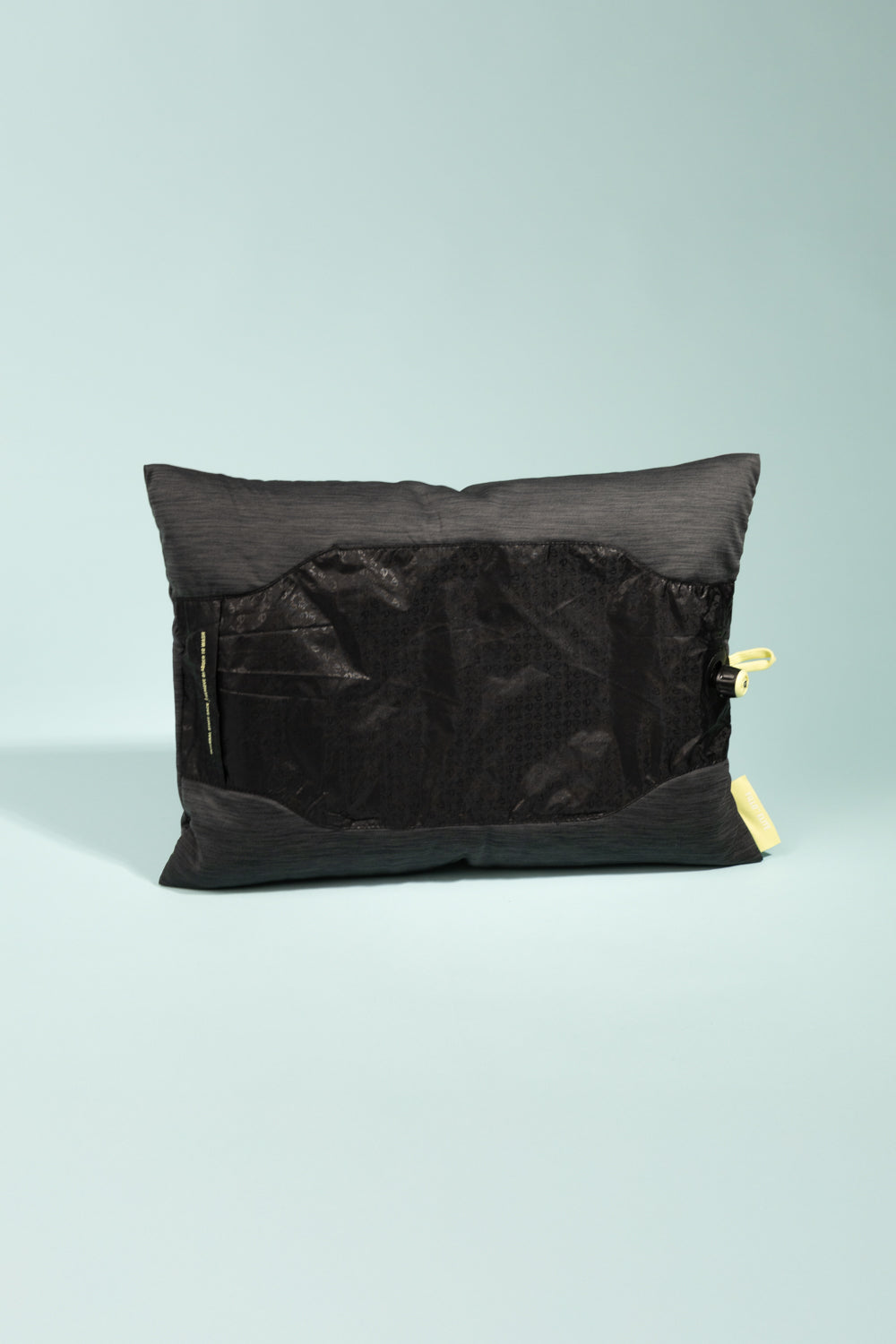 Nemo Fillo Elite Pillow - Black Pearl, soft travel pillow showcased against a light blue background.