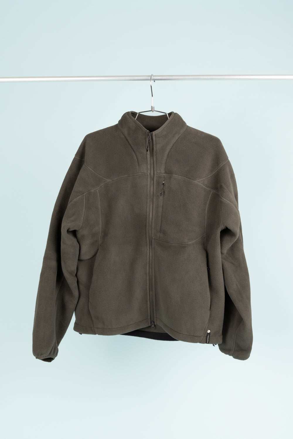 Portal Loam Fleece Jacket in dark olive color, showcasing cozy warmth and lightweight design for outdoor adventures.