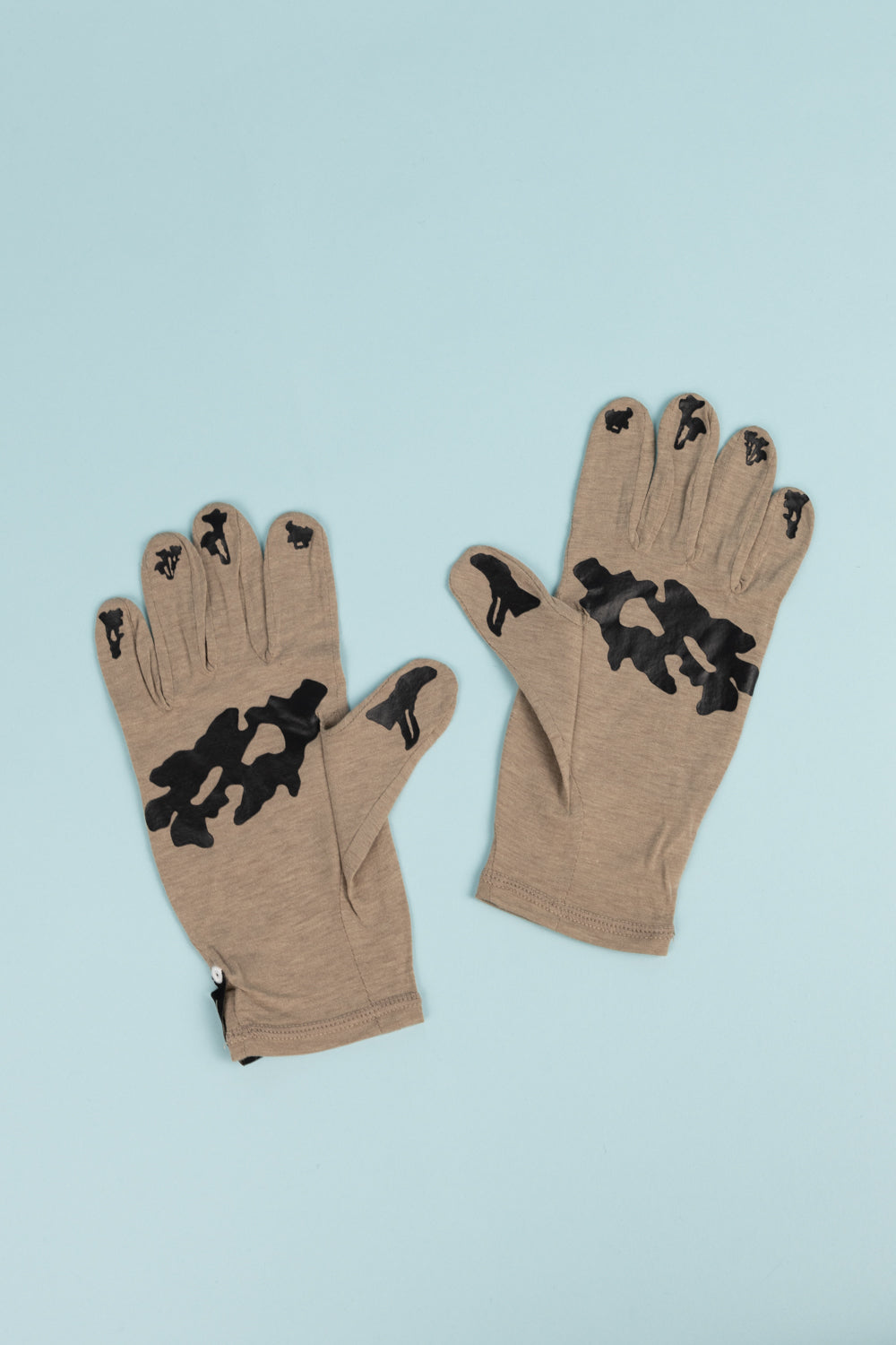 Portal Drift Merino Gloves in Desert Taupe, featuring a soft merino wool blend and durable nylon for outdoor activities.