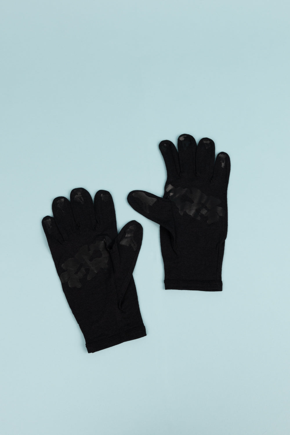 Portal Drift Merino Gloves in black, ideal for chilly runs, rides, and hikes with soft merino wool.