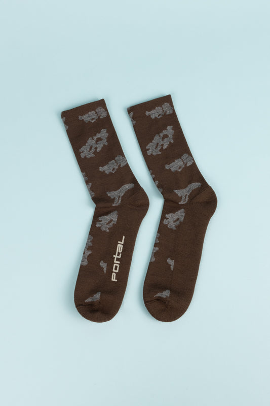 Portal Ritual Merino Socks in Slate Black, ideal for running and hiking with moisture-wicking properties.