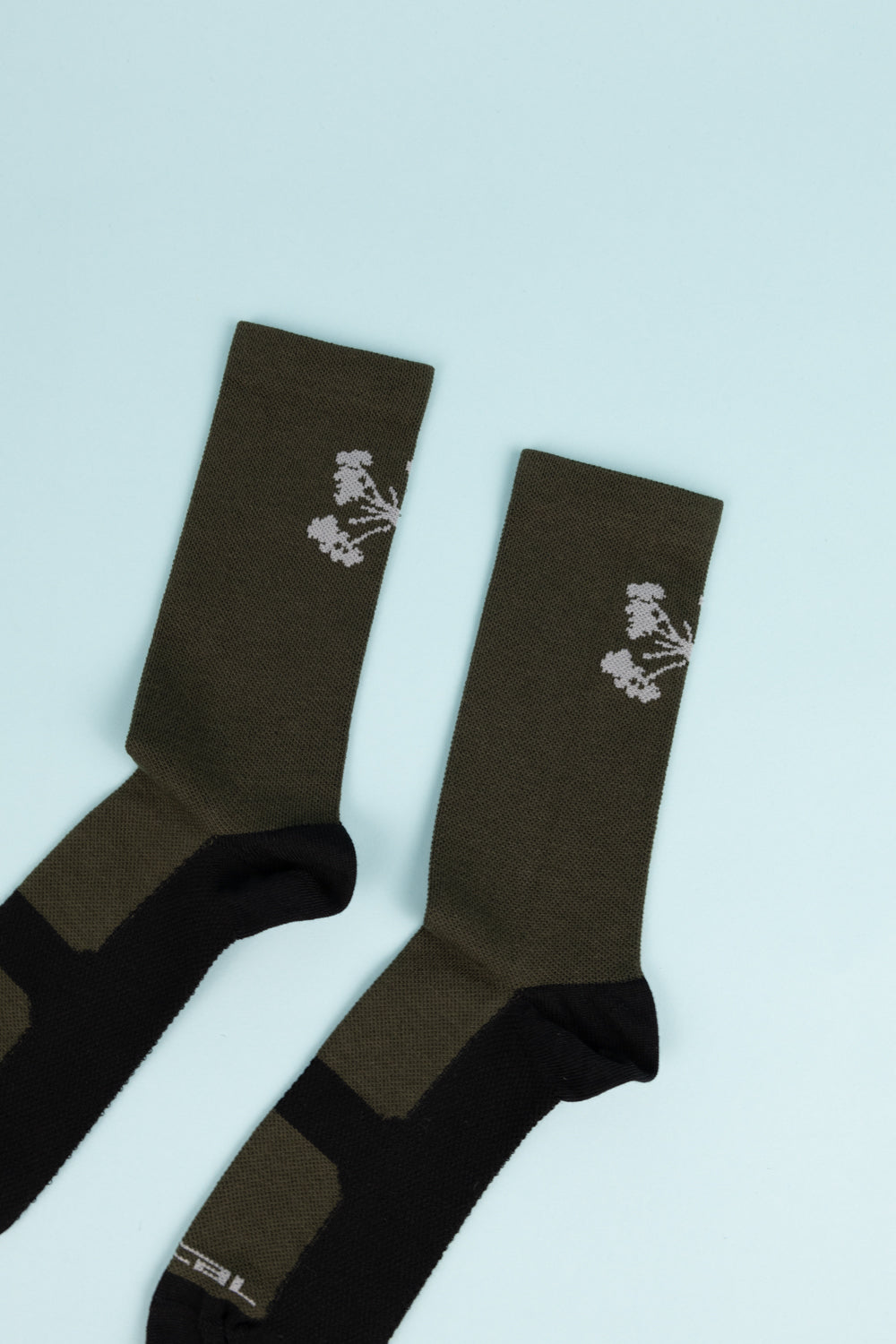 Portal Pattern Active Sock in dark olive color with floral design, perfect for running, hiking, and cycling.