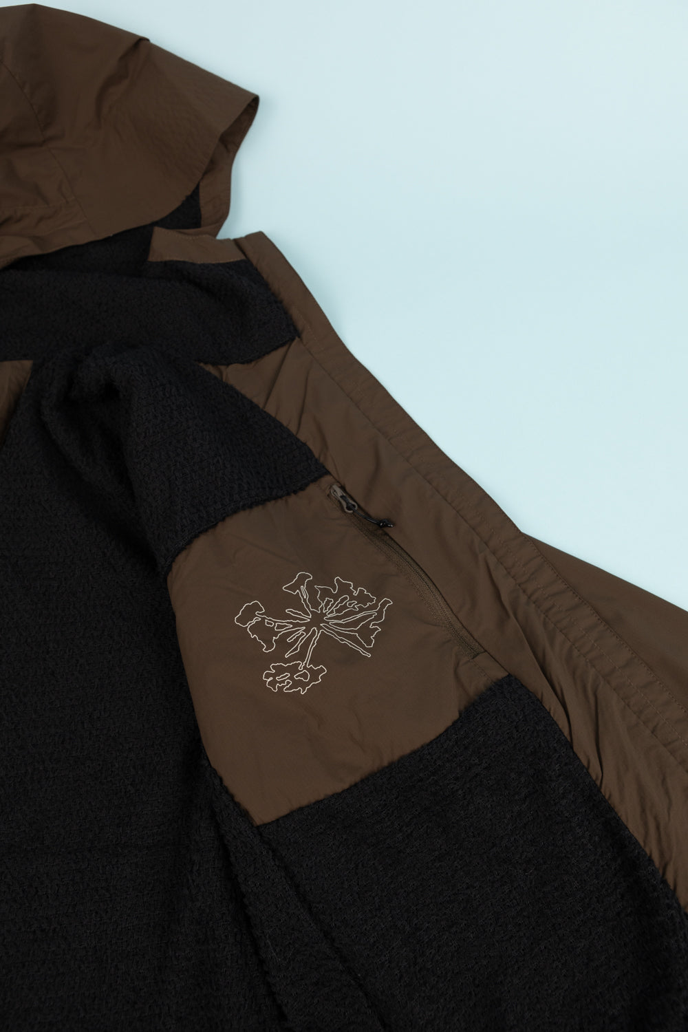 Portal Level Alpha Jacket in slate black, featuring a hood and stylish embroidered logo.