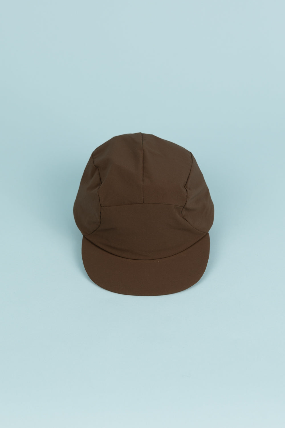 Portal Radius Cap in Slate Black, lightweight and stretchy for a secure fit, ideal for running and everyday wear.