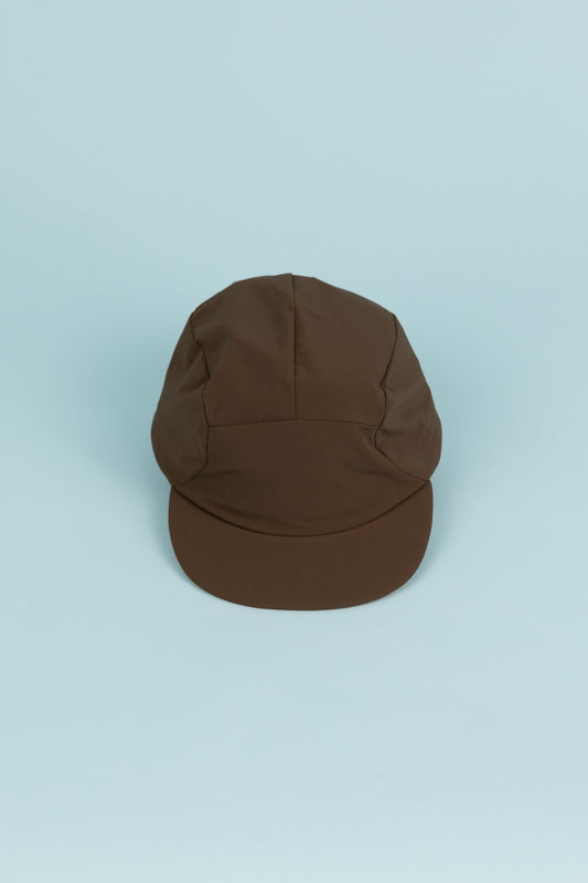 Portal Radius Cap in Slate Black, lightweight and stretchy for a secure fit, ideal for running and everyday wear.