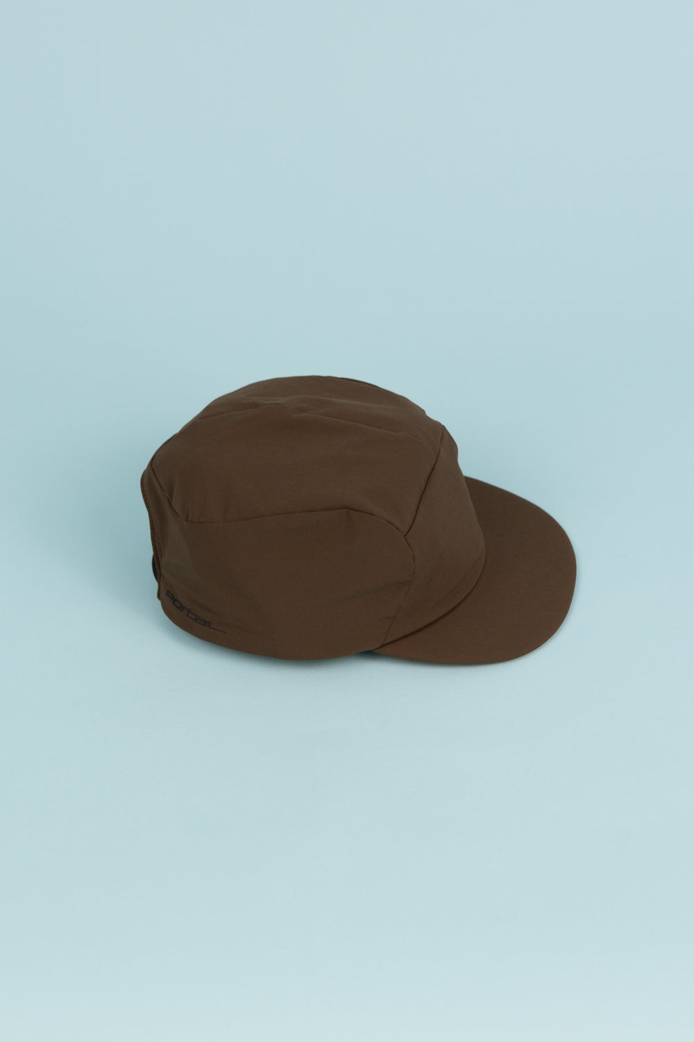 Portal Radius Cap in Slate Black, lightweight, stretchy, designed for running and everyday wear.