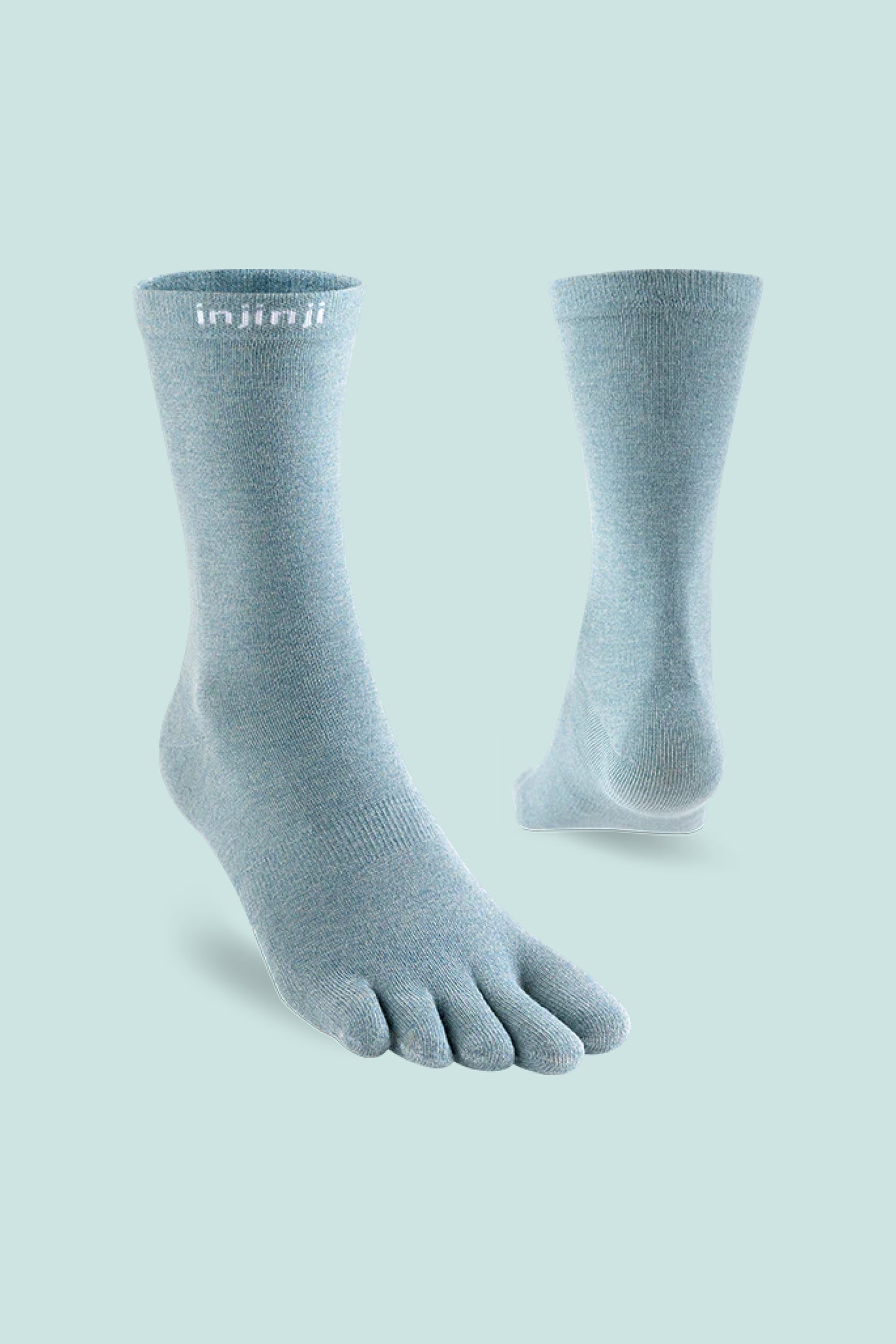 Injinji Coolmax Liner Toe Socks in Celestine color, showcasing breathable toe design for comfort and moisture management.