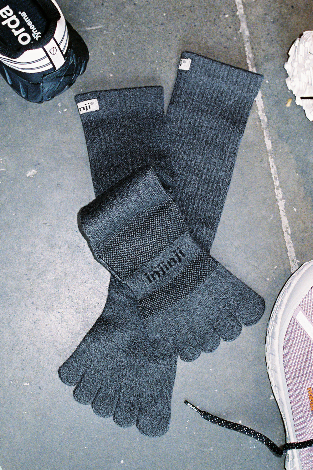 Injinji Coolmax Trail Toe Socks in granite color, designed for hiking and trail running with breathable mesh top.