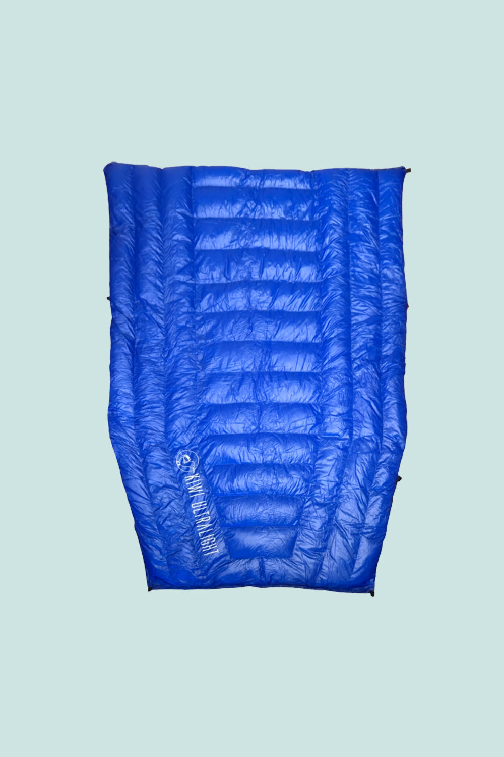 Kiwi Ultralight Quilt 850 Fill Down -5° - Blue showing its soft material and design for outdoor sleeping adventures.