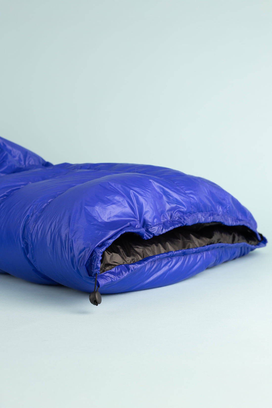 Kiwi Ultralight Quilt 850 Fill Down -5° - Blue showing the open underside design for outdoor comfort.