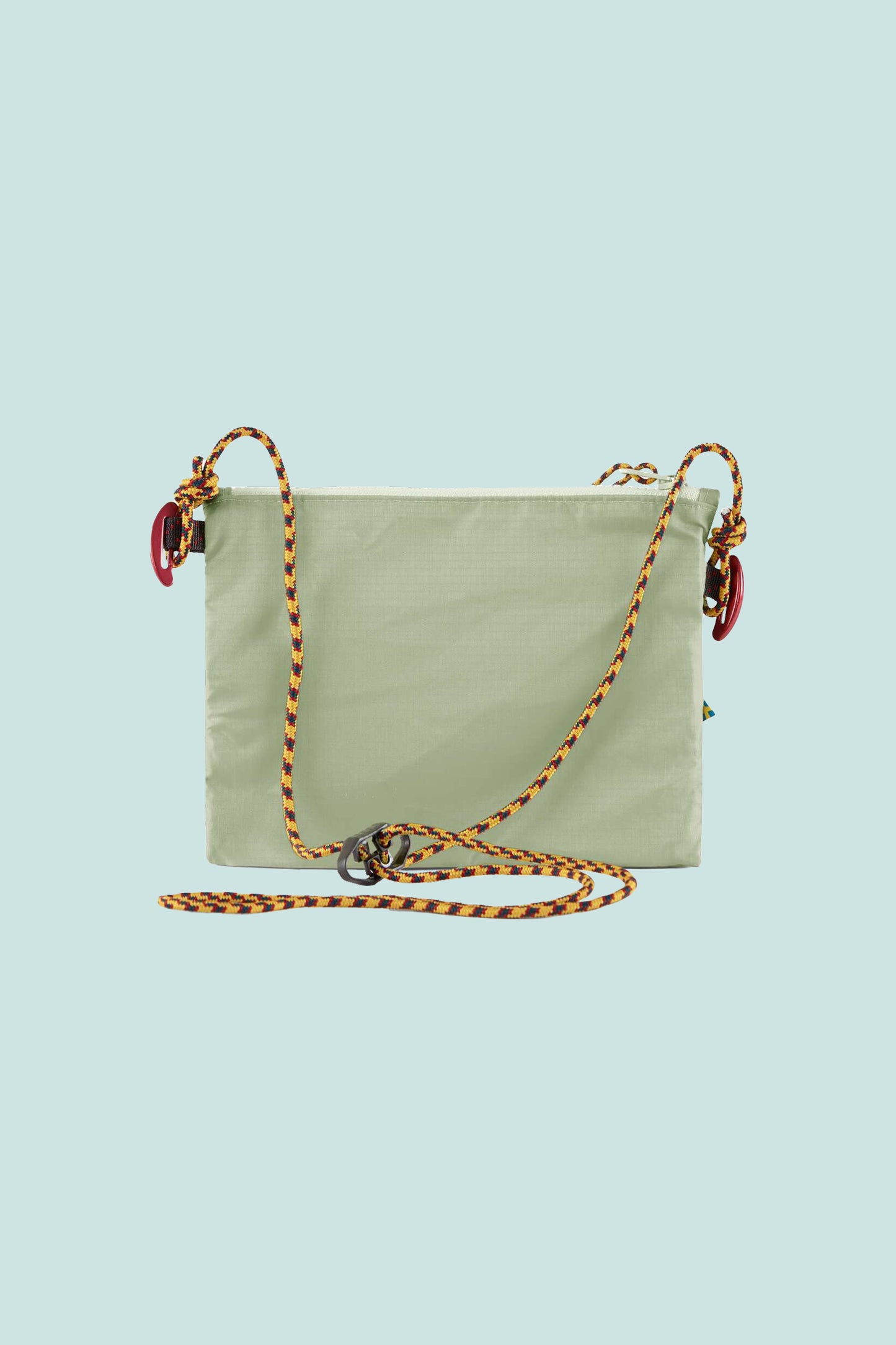Klattermusen Algir Accessory Bag Small - Sea Foam with adjustable strap and external mesh pocket.