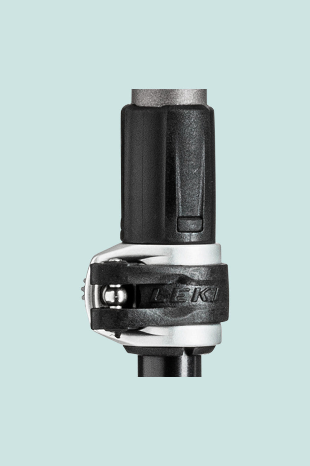 Close-up of Leki Cressida AS pole locking mechanism, showcasing adjustable features for trekking and hiking.