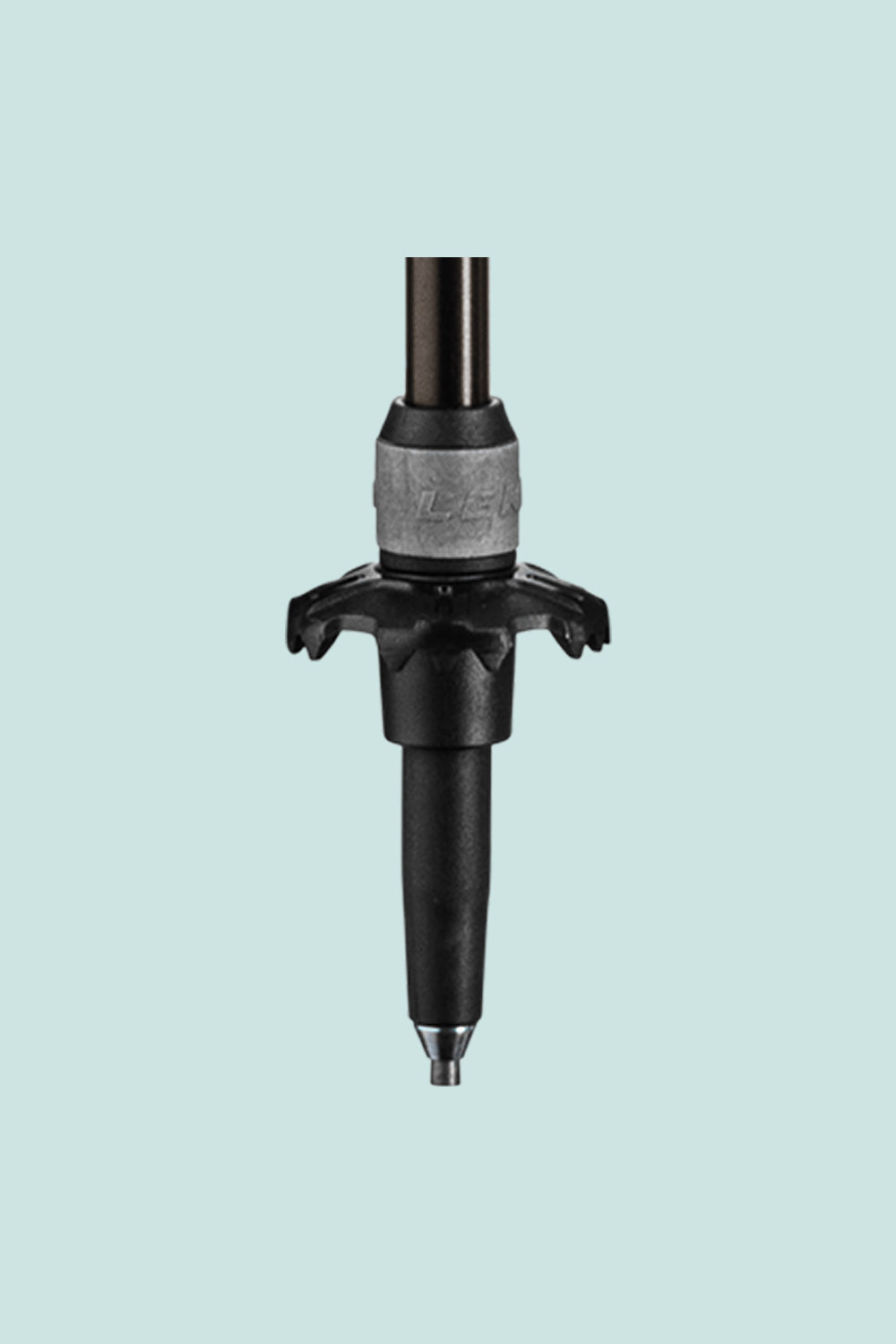 Close-up of Leki Cressida AS trekking pole tip showcasing its anti-shock feature for improved comfort during hiking.