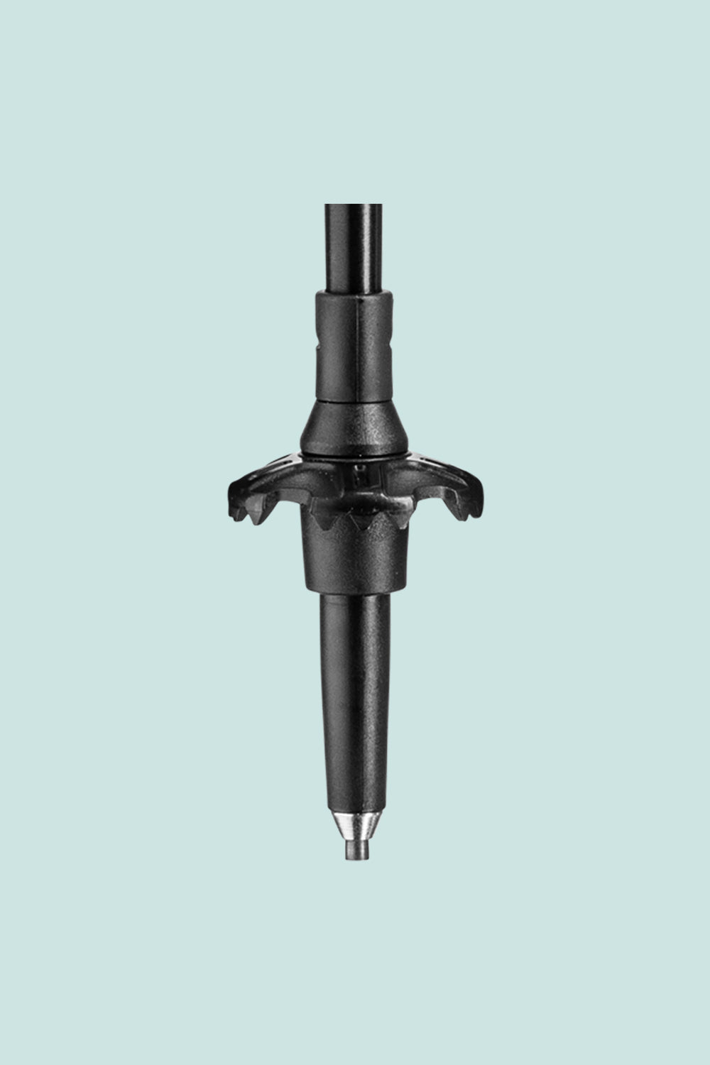 Close-up of the tip of Leki Khumbu trekking pole, showcasing its adjustable, durable design for trekking adventures.