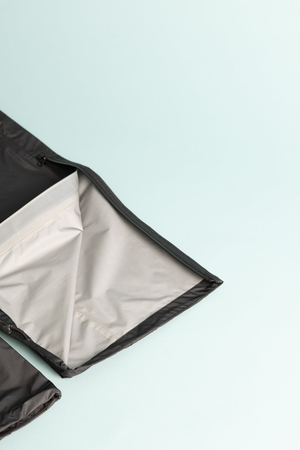 Montbell US Men's Dry-Tec U.L. Rain Pants interior view showcasing lightweight fabric and design.