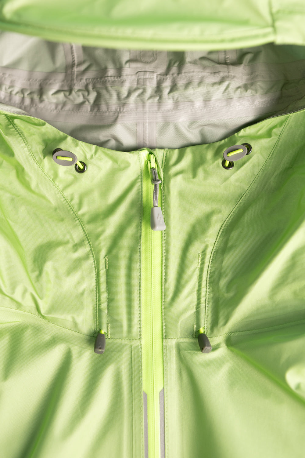 Montbell US Women's Versalite Jacket - Light Green close-up of hood and zipper details