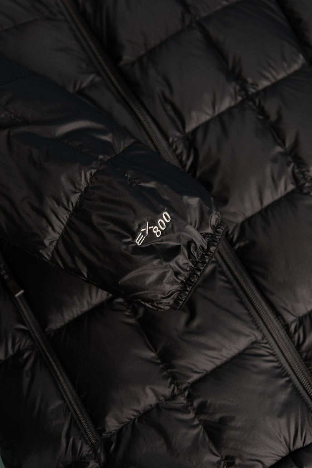 Montbell US Men's Superior 800 Down Jacket - Black close-up view showcasing its premium down insulation.